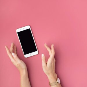 Image of a phone where you can use Later Instagram for scheduling.