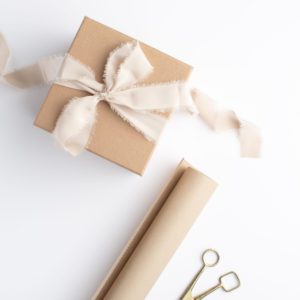 Image of wrapped gifts with ribbons.