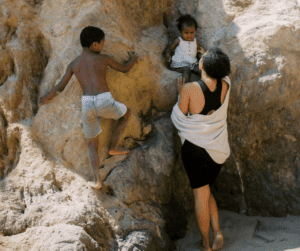 Mother and children out exploring new town they moved to as part of their gift baskets for new homeowners gifts. 