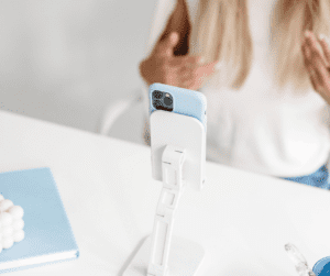 Image of woman filming herself doing an Instagram Reel or Creator Video.