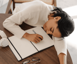 Image of a woman staring at a blank page showing someone not knowing about email marketing and wondering how to start with grow your email list.