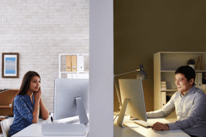 Image of couple chatting on computers for sweet things to do in a long distance relationship.